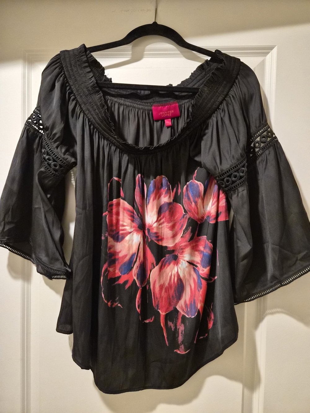Jennifer Lopez Black Off-the-Shoulder Blouse with Pink and Blue Floral Motif